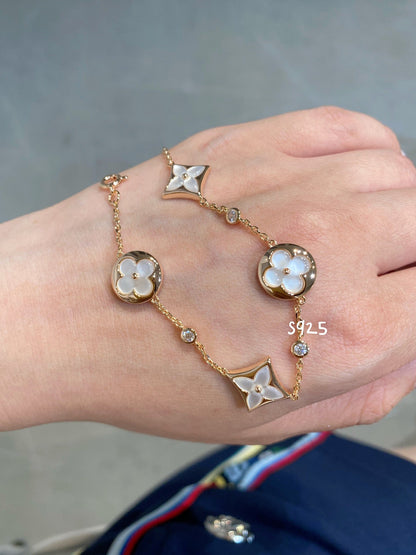 [Loui]STAR AND SUN 4 MOTIF WHITE MOP PINK GOLD BRACELET