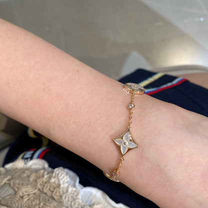 [Loui]STAR AND SUN 4 MOTIF WHITE MOP PINK GOLD BRACELET