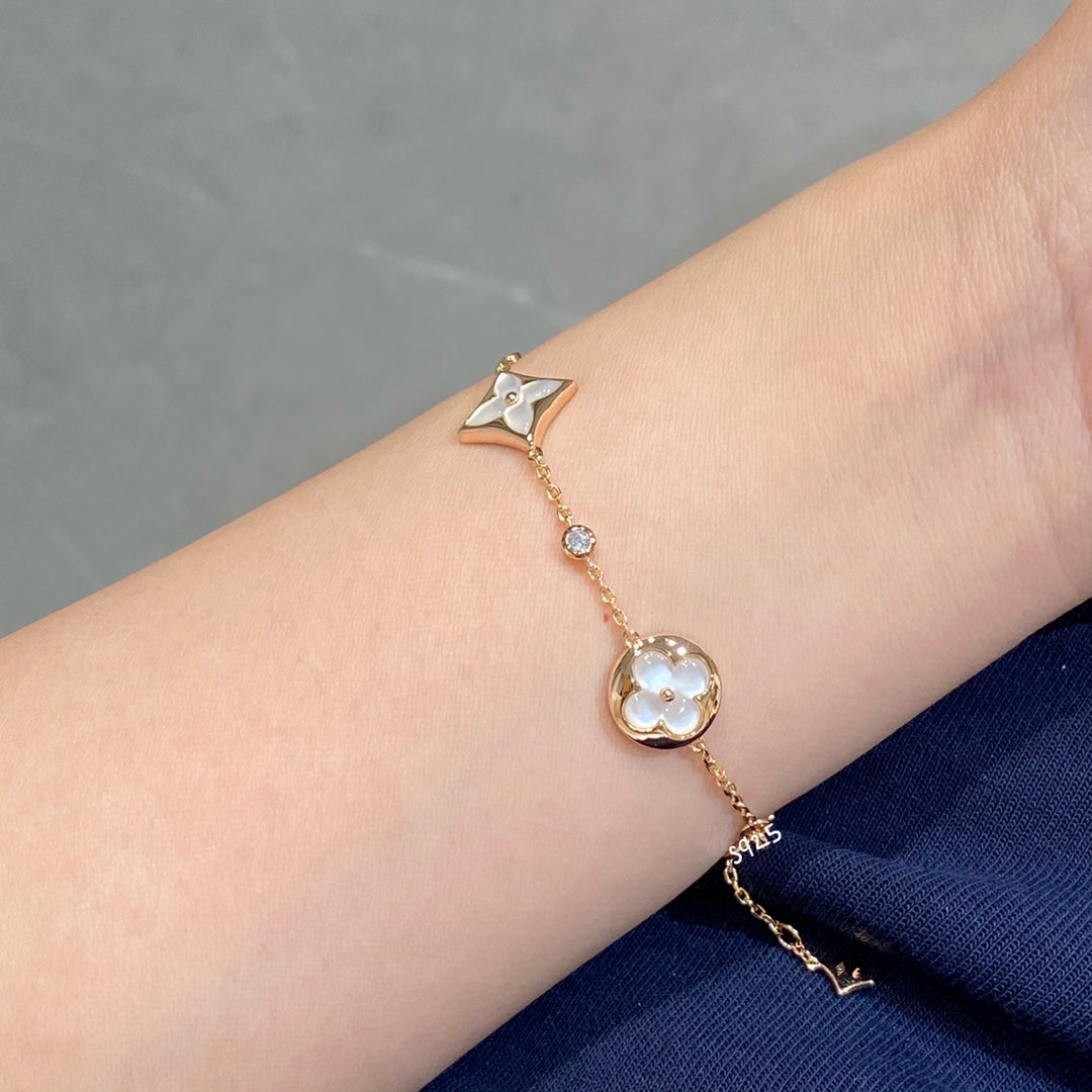 [Loui]STAR AND SUN 4 MOTIF WHITE MOP PINK GOLD BRACELET