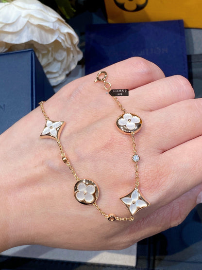 [Loui]STAR AND SUN 4 MOTIF WHITE MOP PINK GOLD BRACELET